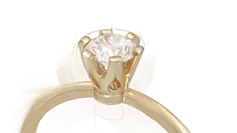 złoty pierścionek z brylantem